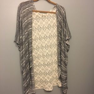 Knitted shawl with white lace back